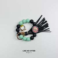 Black & Mint Dual Sided Skeleton Silicone Wristlet