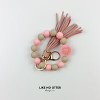 Pink & Tan Leo Zodiac Sign Silicone Wristlet