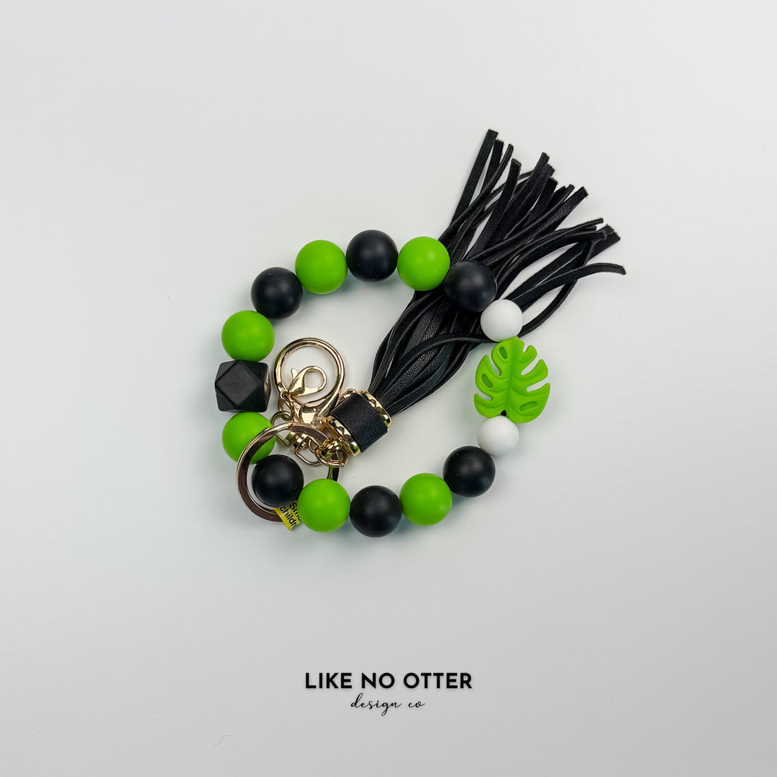 Green, Black & White Monstera Silicone Wristlet
