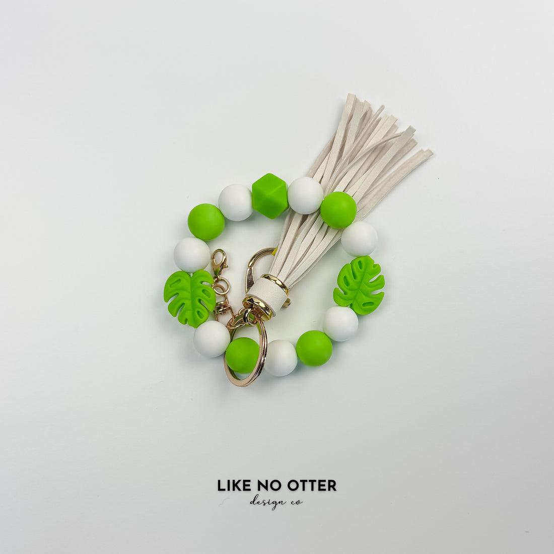 Green & White Monstera Silicone Wristlet