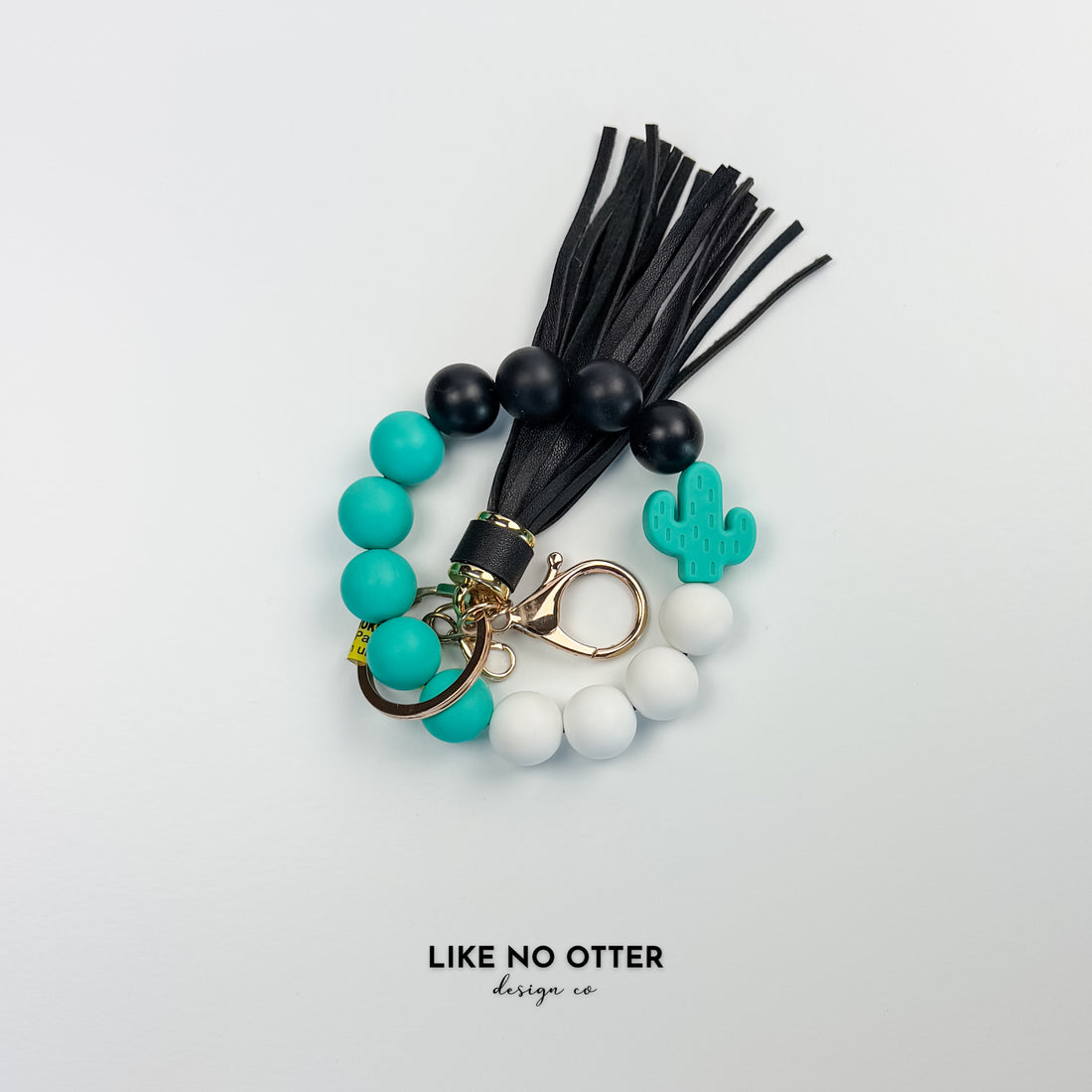 Teal, White & Black Cactus Silicone Wristlet
