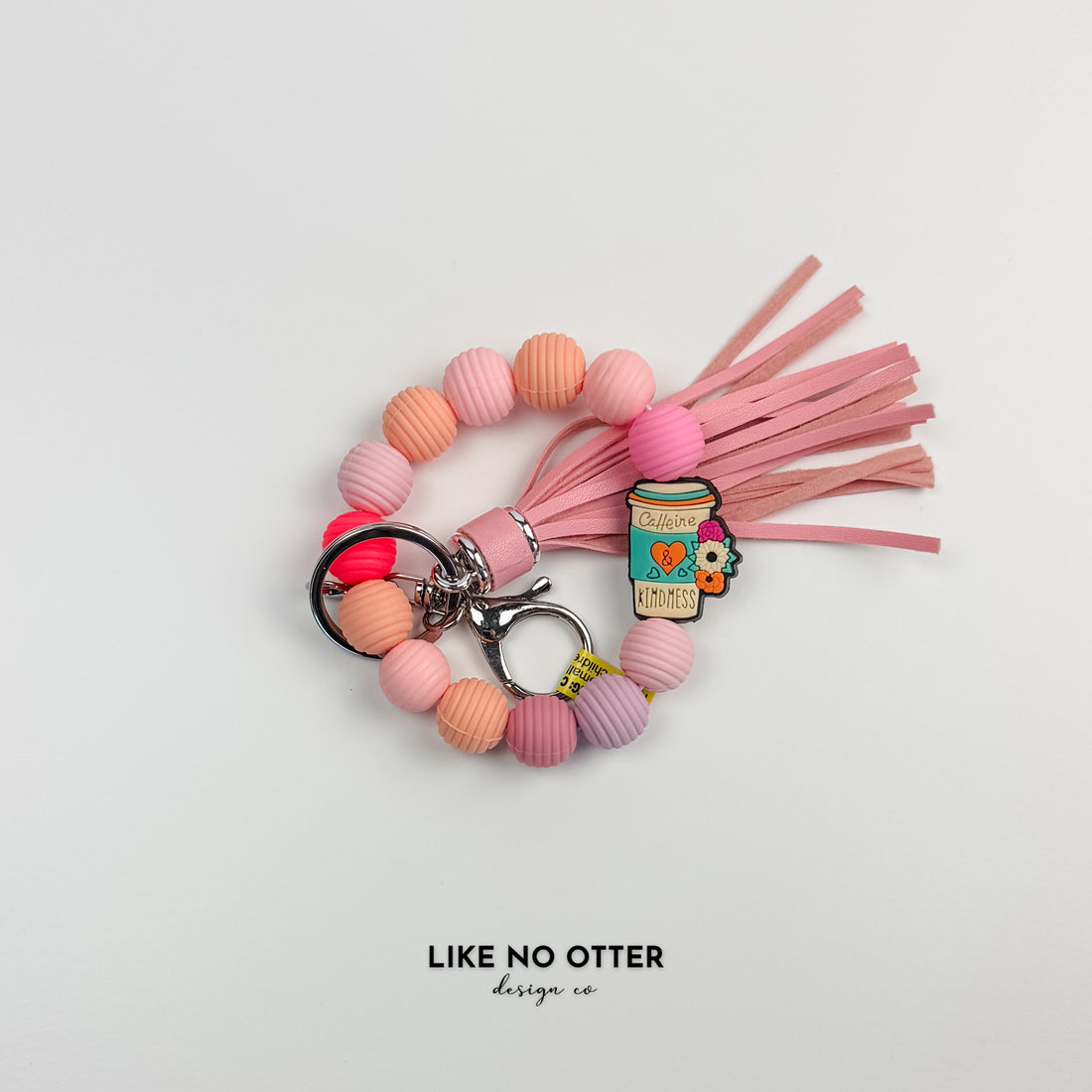 Pink & Tan Caffeine & Kindness Silicone Wristlet