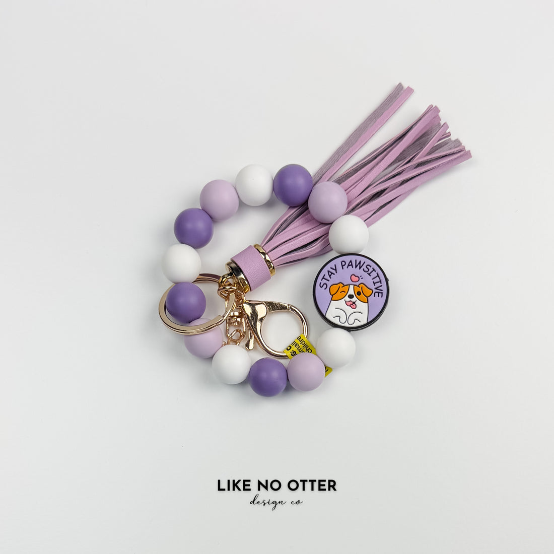 Purple & White Stay Pawsitive Silicone Wristlet