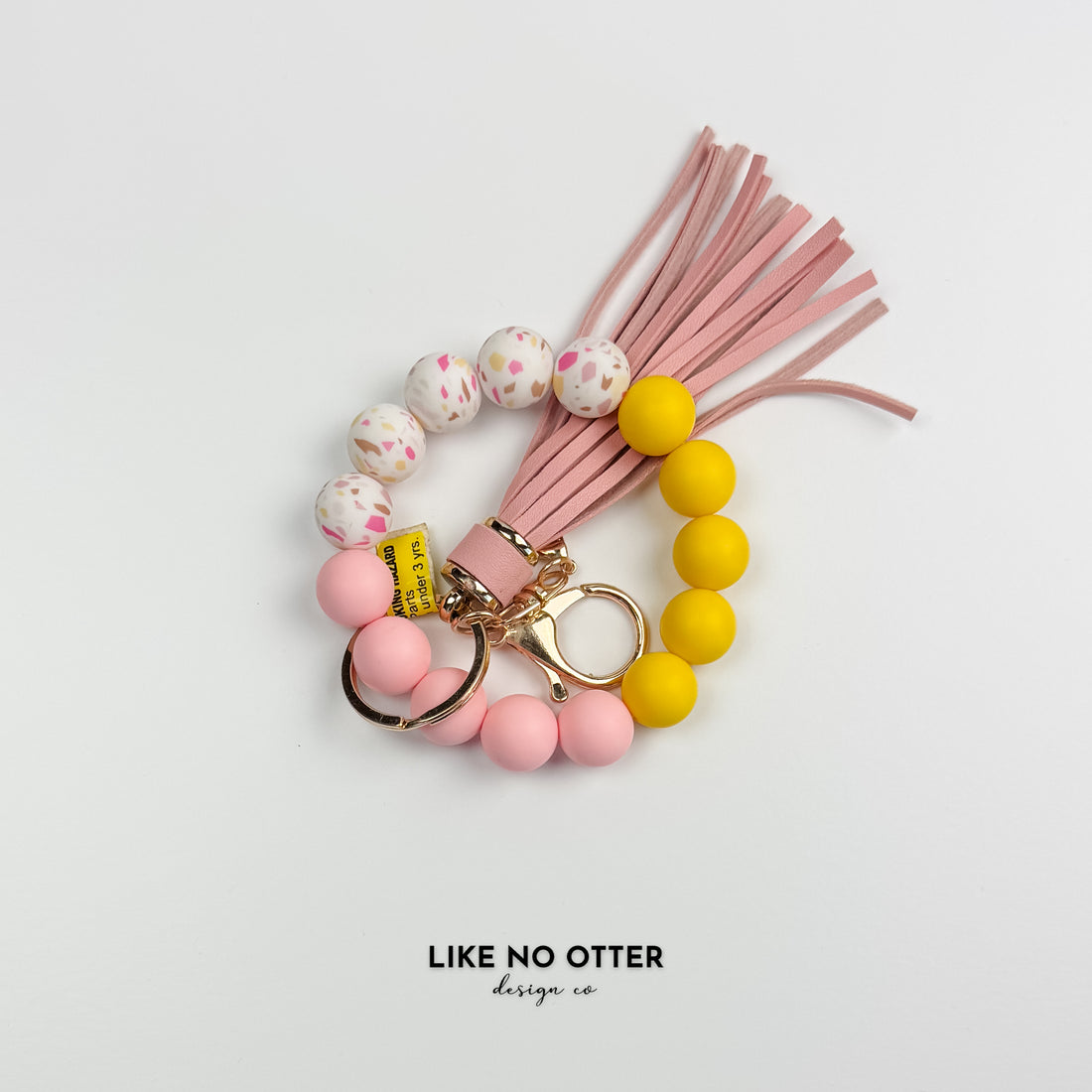 White & Yellow Speckle Silicone Wristlet