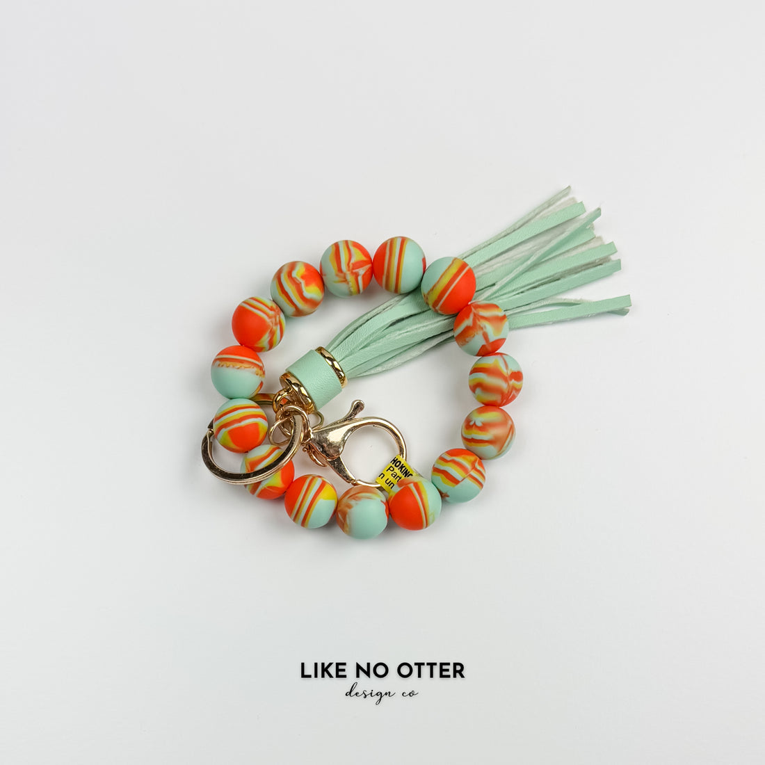 Orange & Teal Marbled Silicone Wristlet