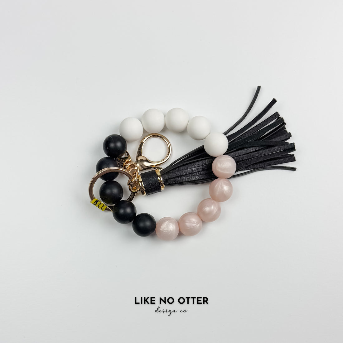 Pearl Pink, White & Black Silicone Wristlet