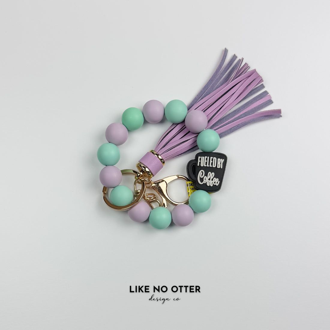 Purple & Mint Fueled by Coffee Silicone Wristlet