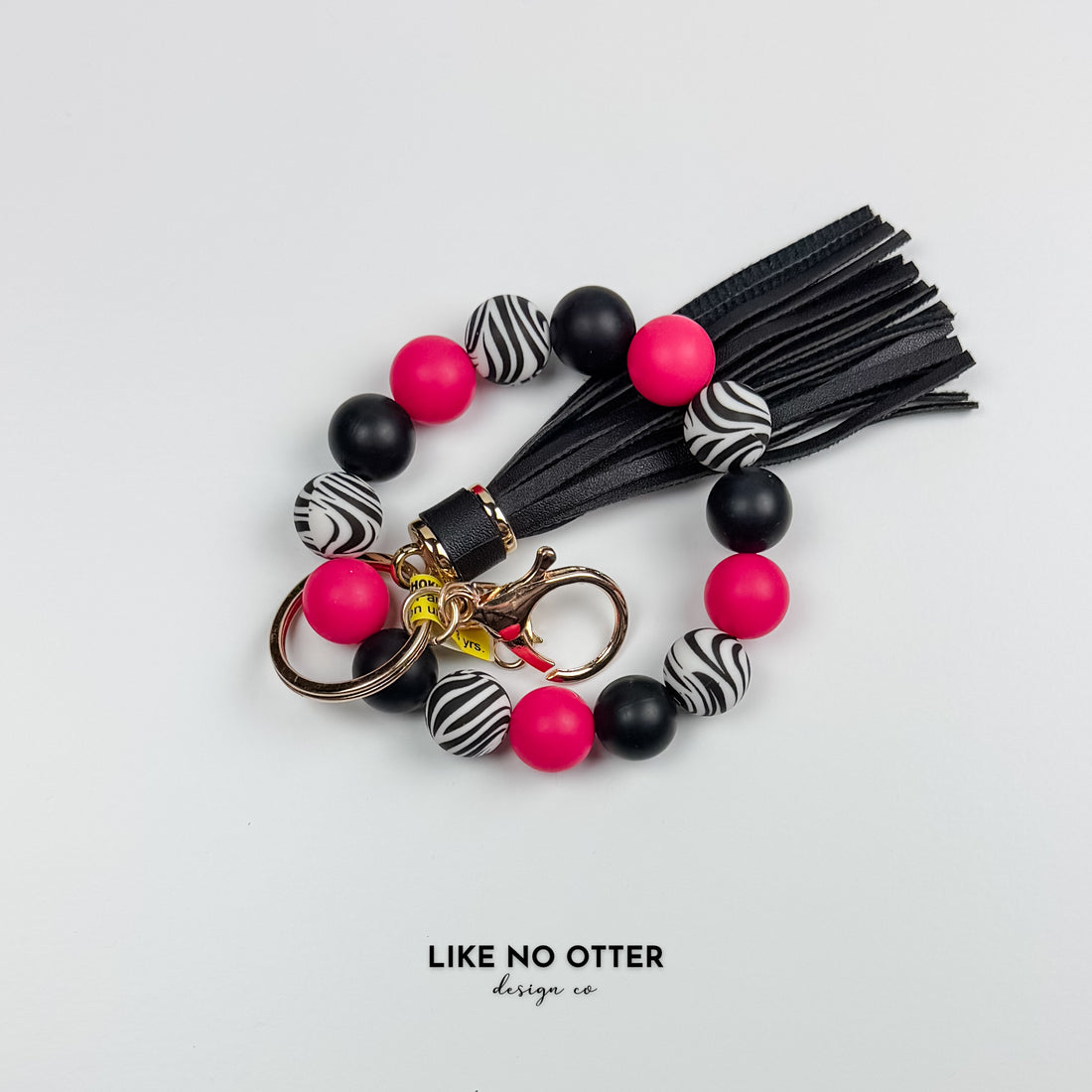 Magenta & Black Zebra Print Silicone Wristlet