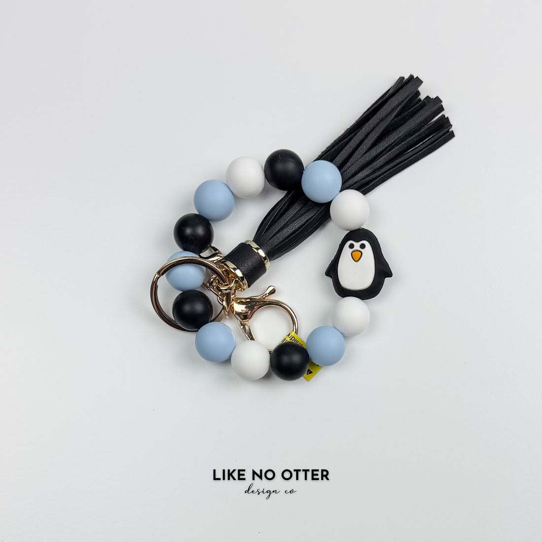 White & Blue Penguin Silicone Wristlet