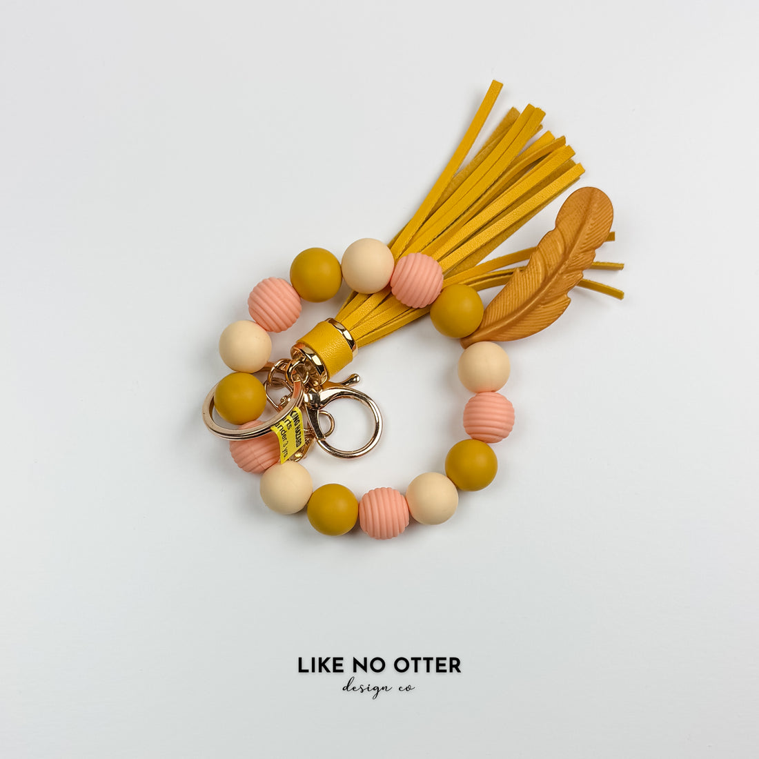 Yellow & Pink Feather Silicone Wristlet