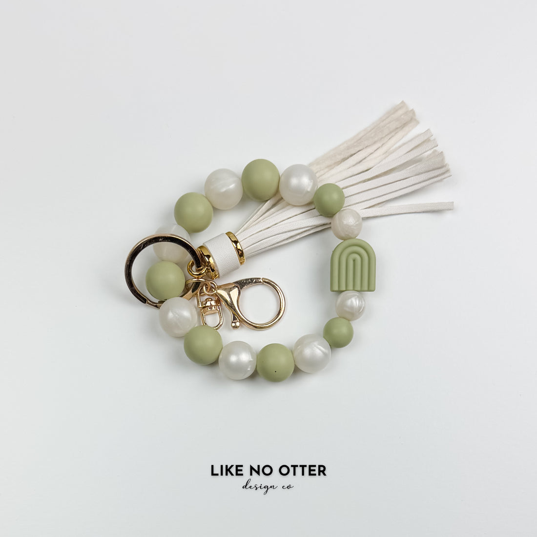 Green & Pearl Rainbow Silicone Wristlet