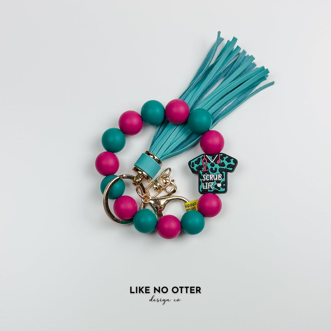 Teal & Mauve Scrub Life Cheetah Print Silicone Wristlet