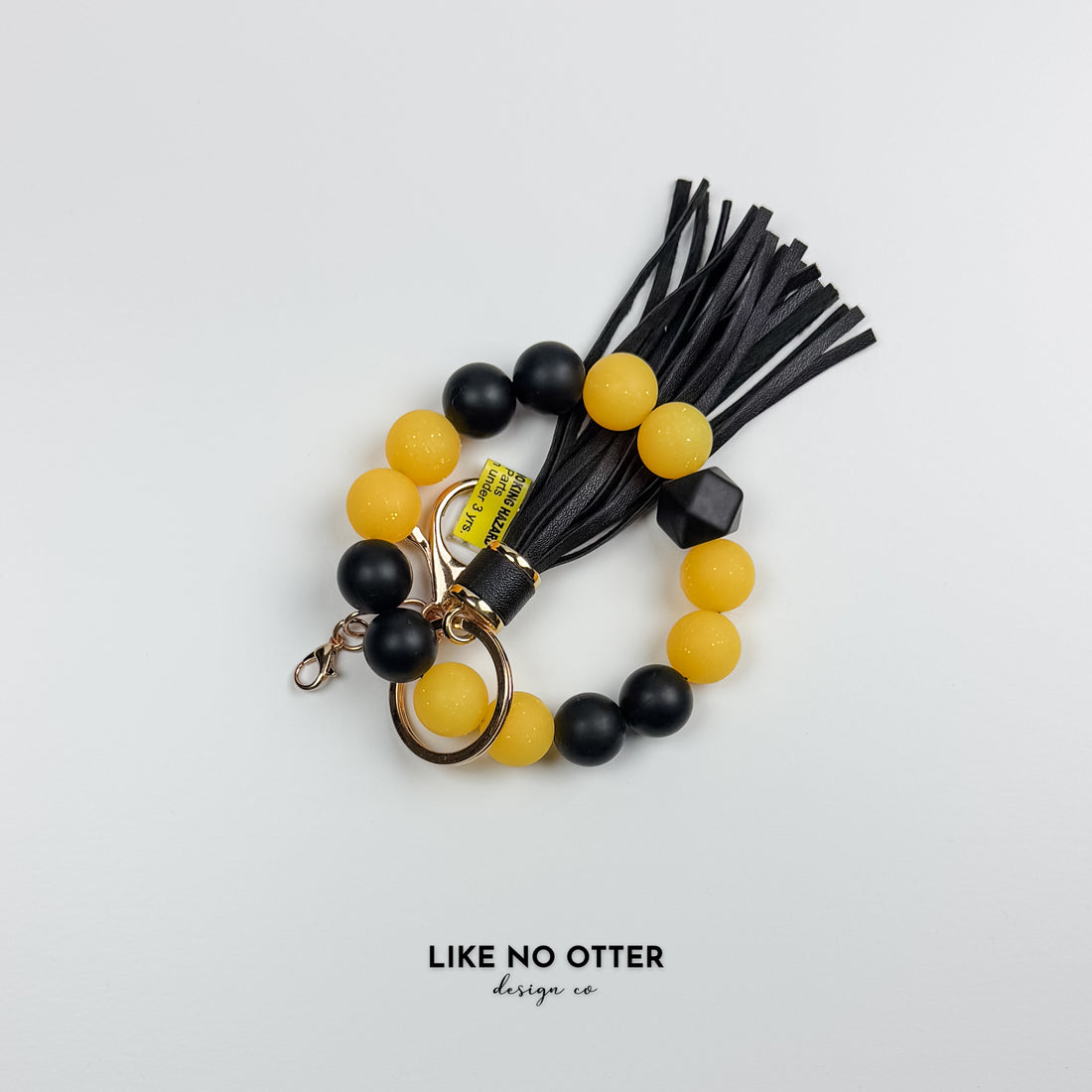 Yellow Glitter & Black Silicone Wristlet