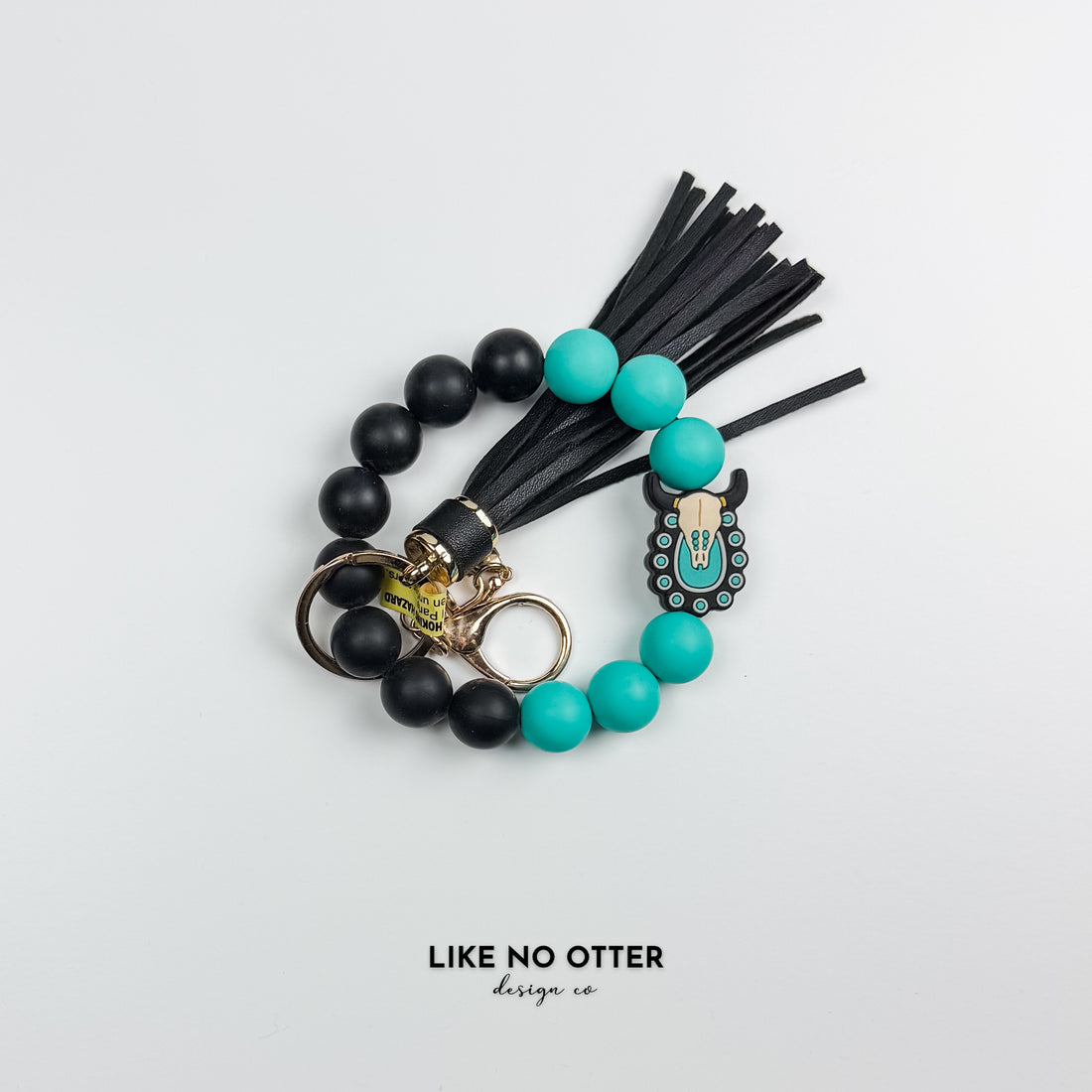 Teal & Black Skull Silicone Wristlet