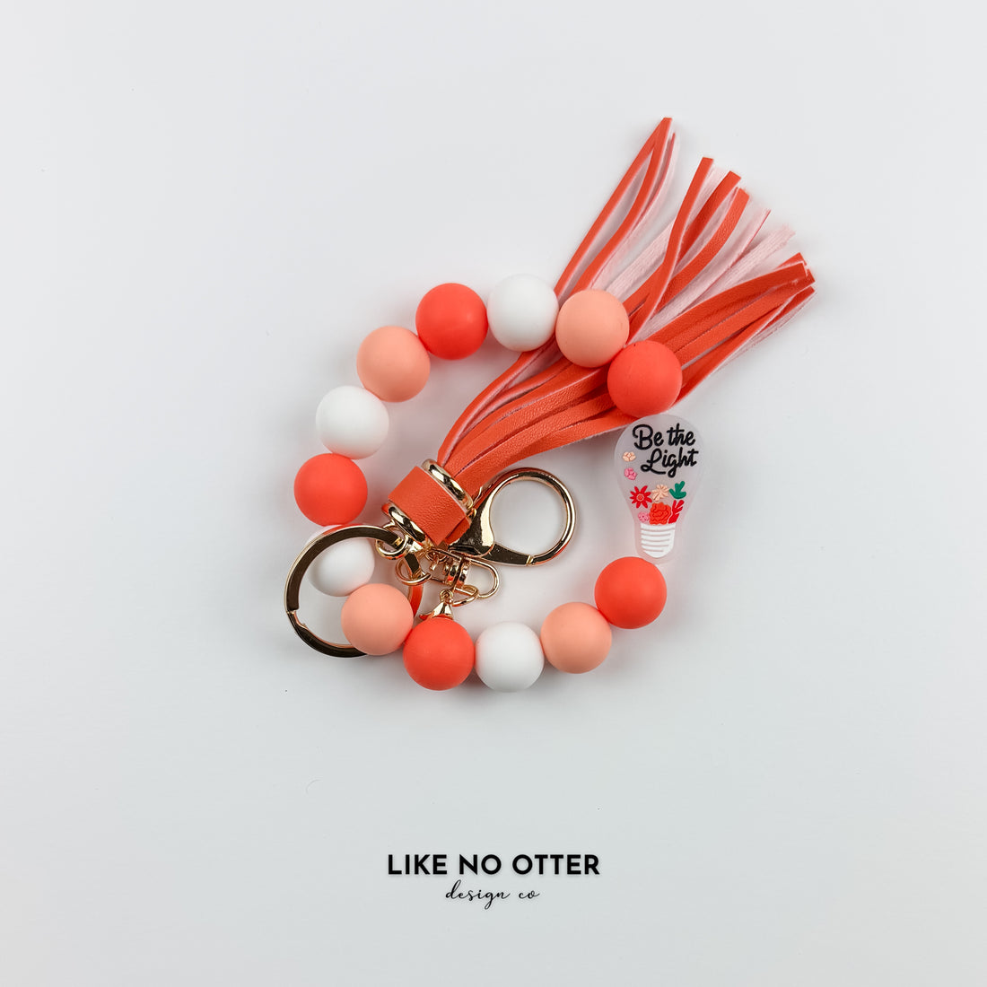 Orange & Coral Be the Light Silicone Wristlet