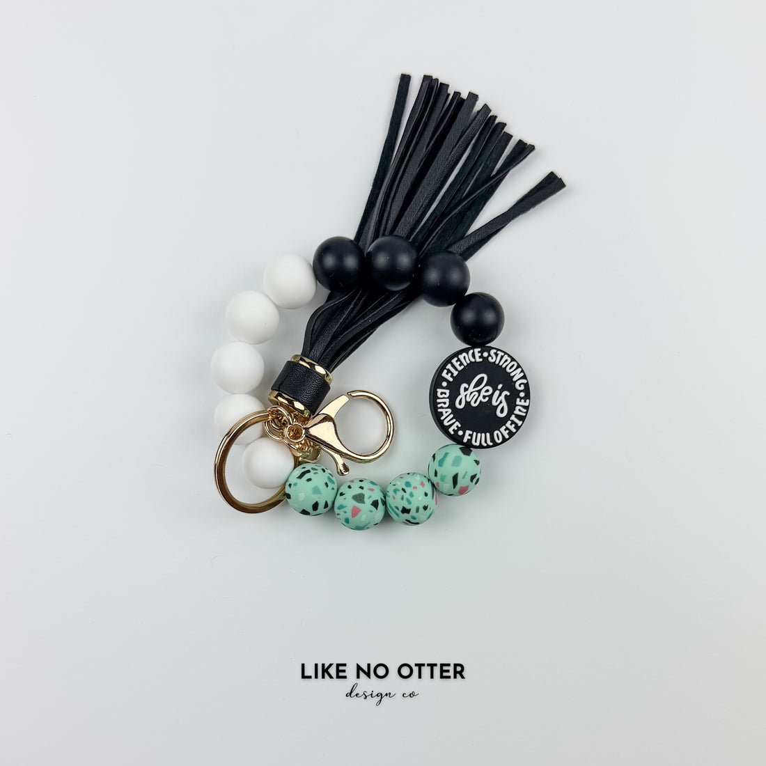Teal, Speckle & Black She Is & Speckle Silicone Wristlet
