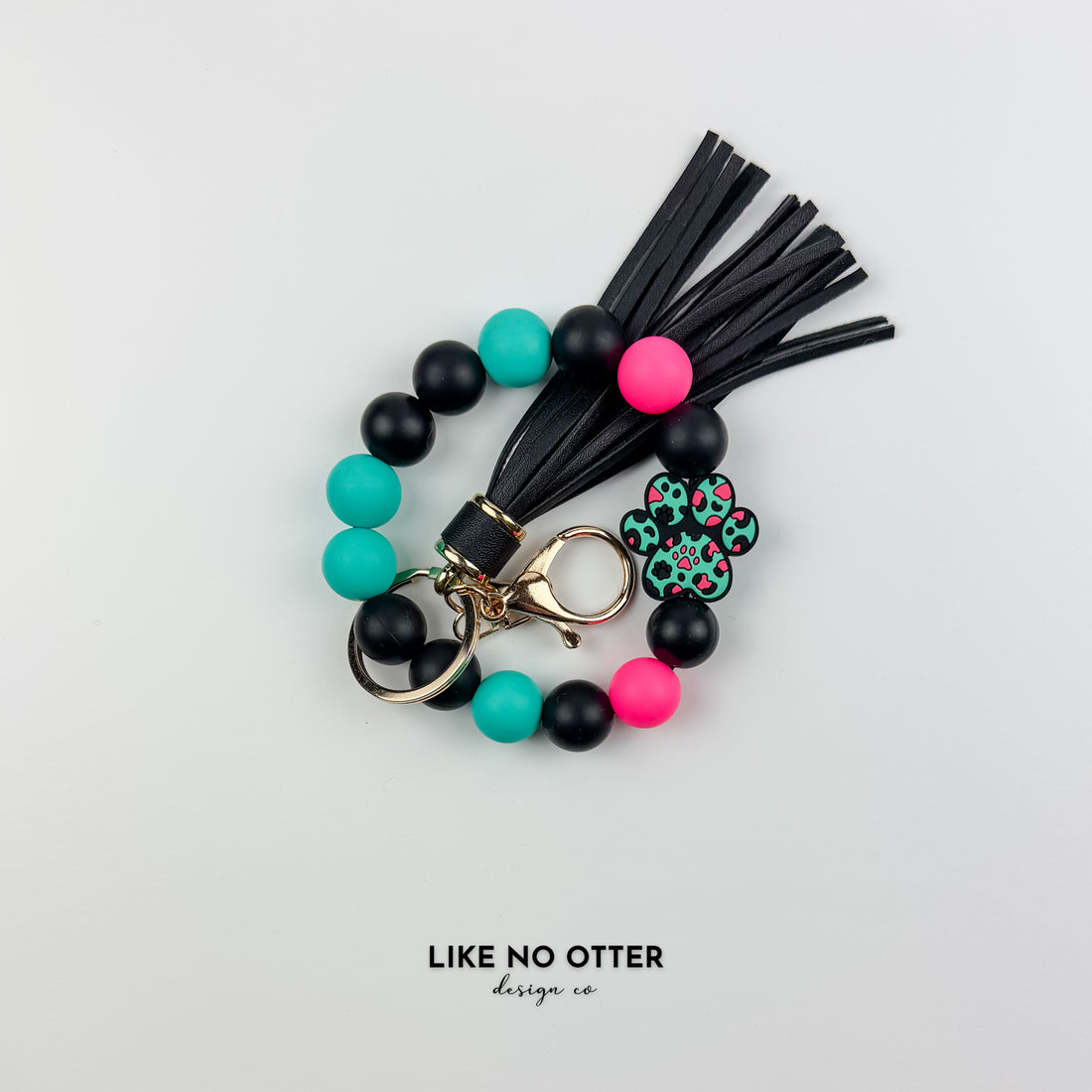 Teal, Black & Pink Paw Print Silicone Wristlet