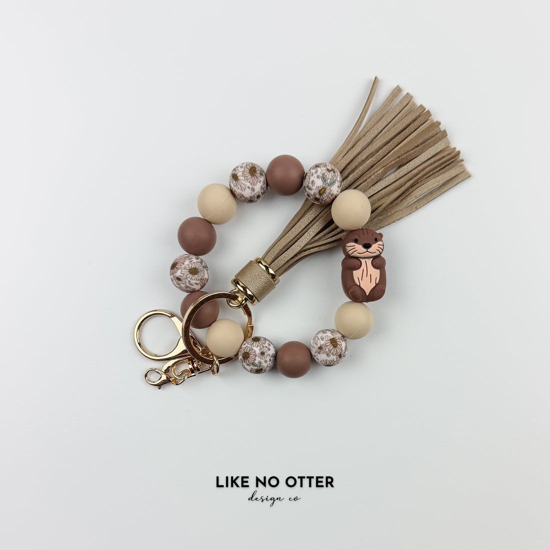 Brown, Tan & Floral Otter Silicone Wristlet