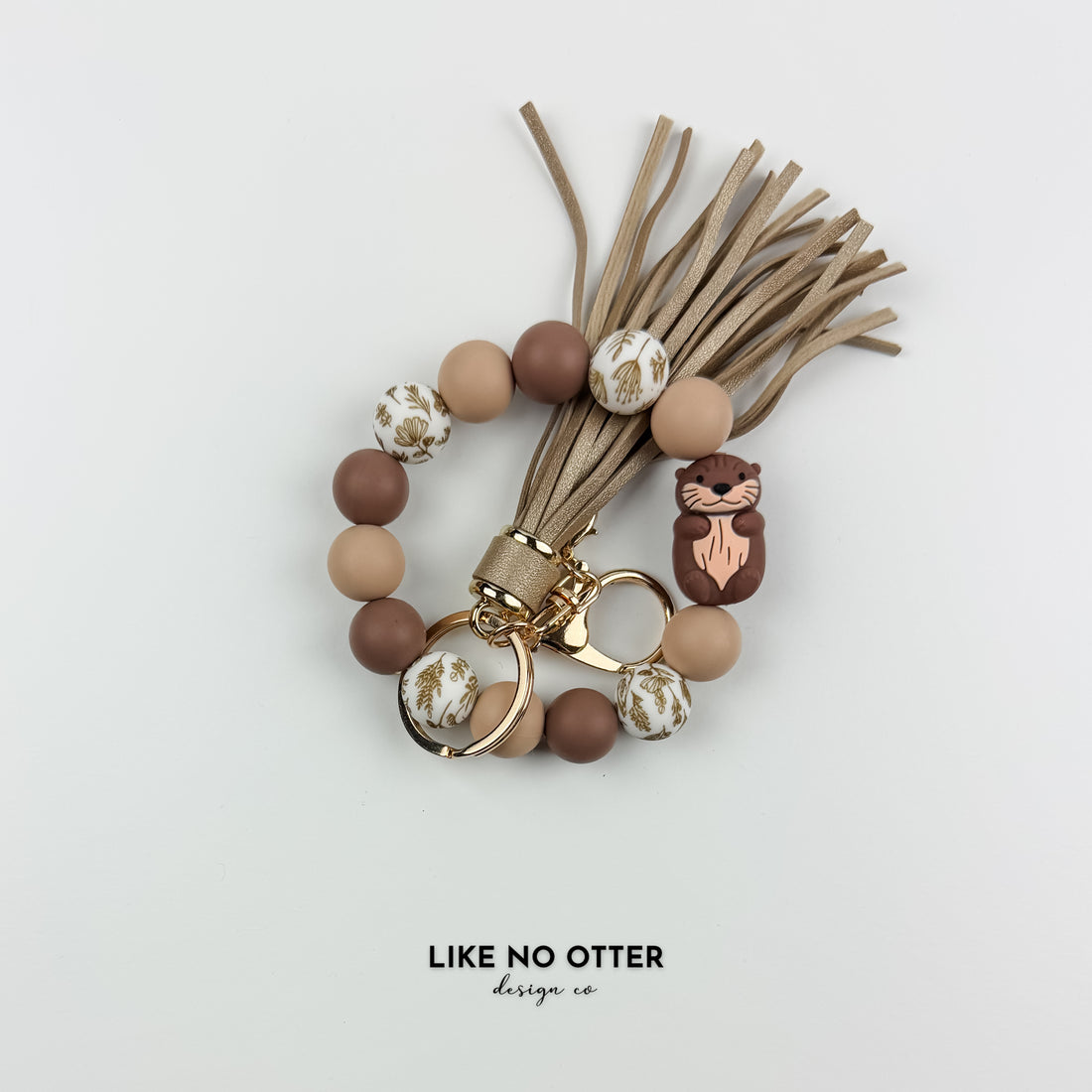 Brown, Tan & Floral Otter Silicone Wristlet