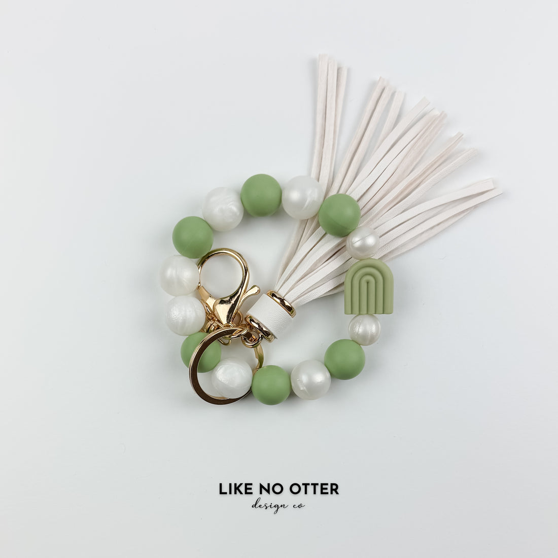 Green & Pearl Rainbow Silicone Wristlet
