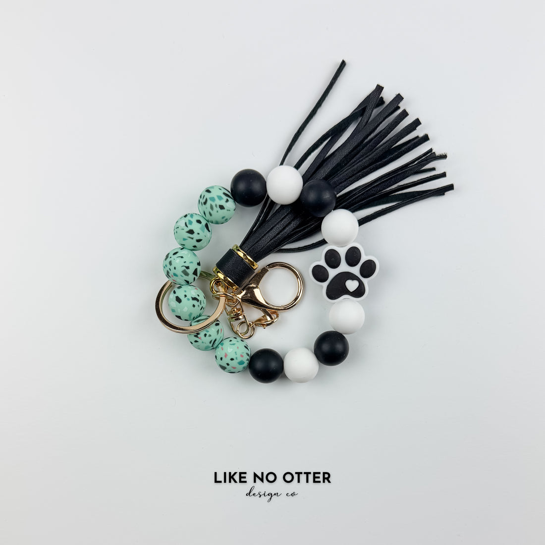 Teal Speckle & Black Paw Print Silicone Wristlet
