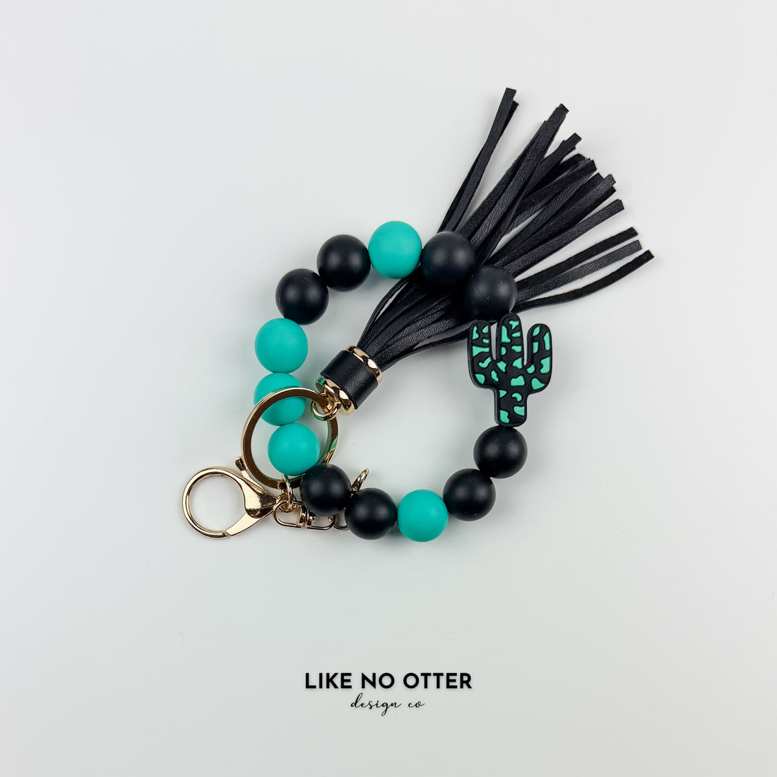 Teal & Black Cactus Silicone Wristlet