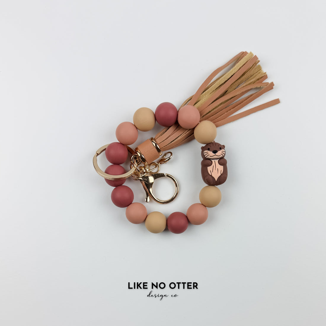 Mauve & Tan Otter Silicone Wristlet