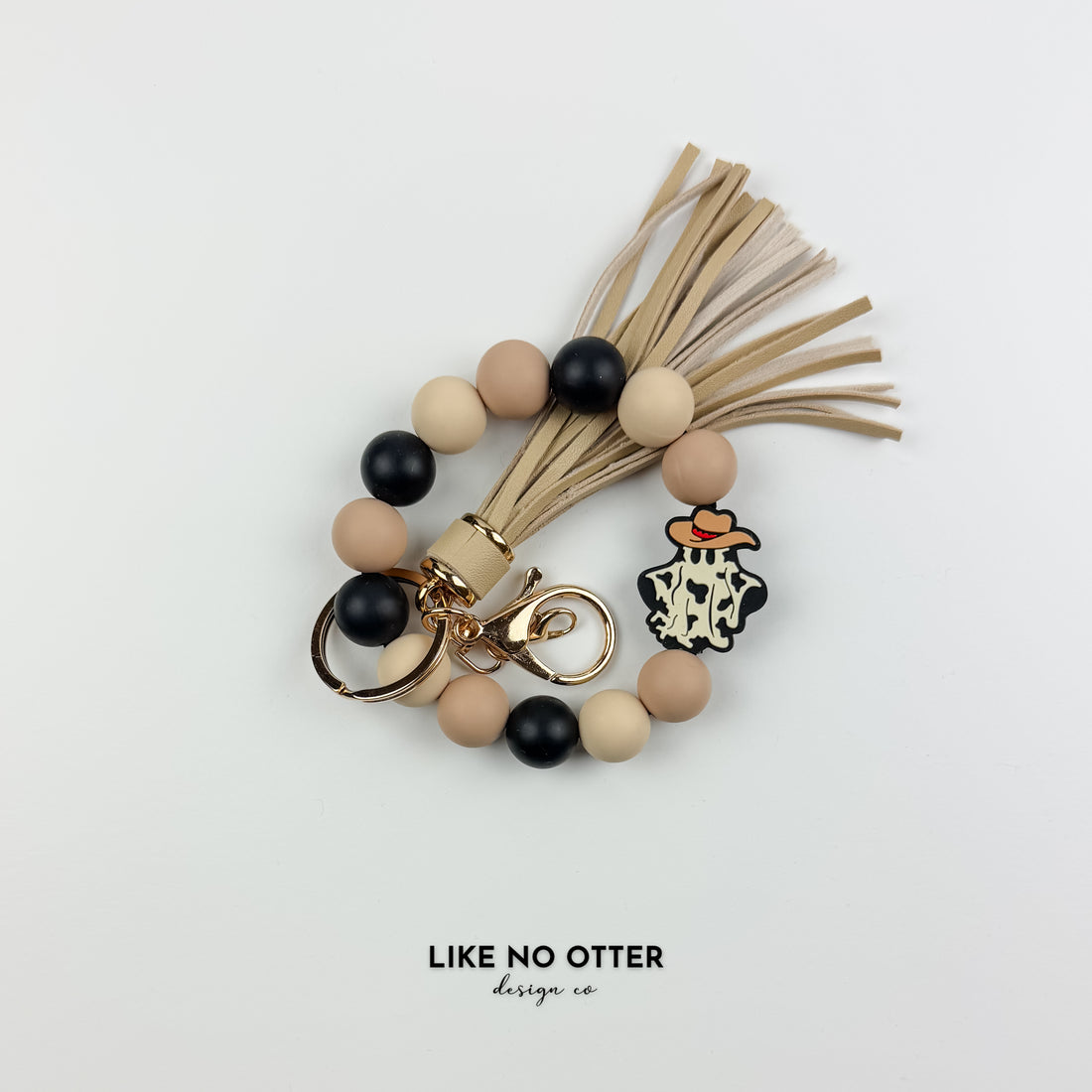Tan & Black Cowboy Ghost Silicone Wristlet