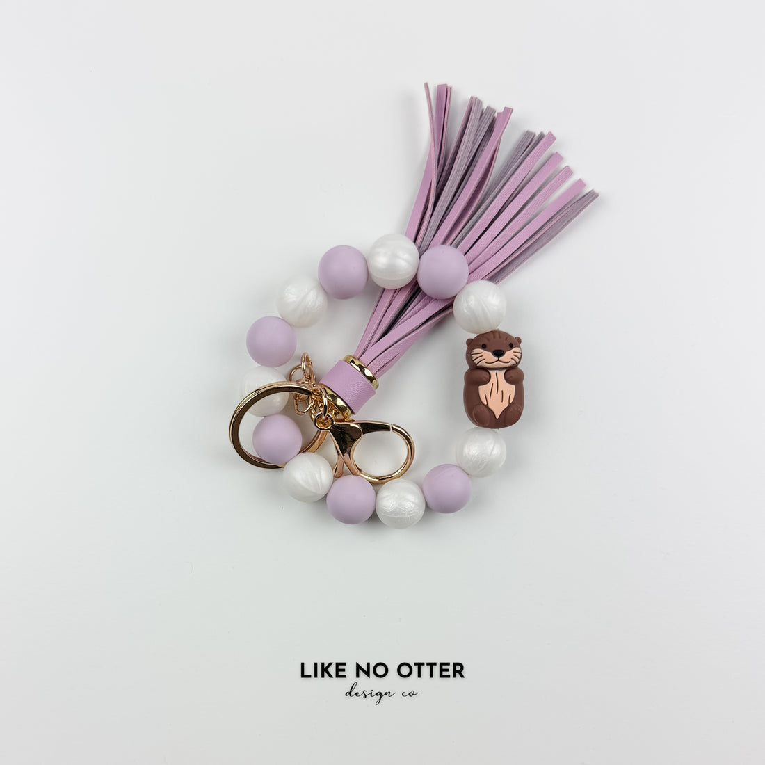 Purple, Pearl & White Otter Silicone Wristlet