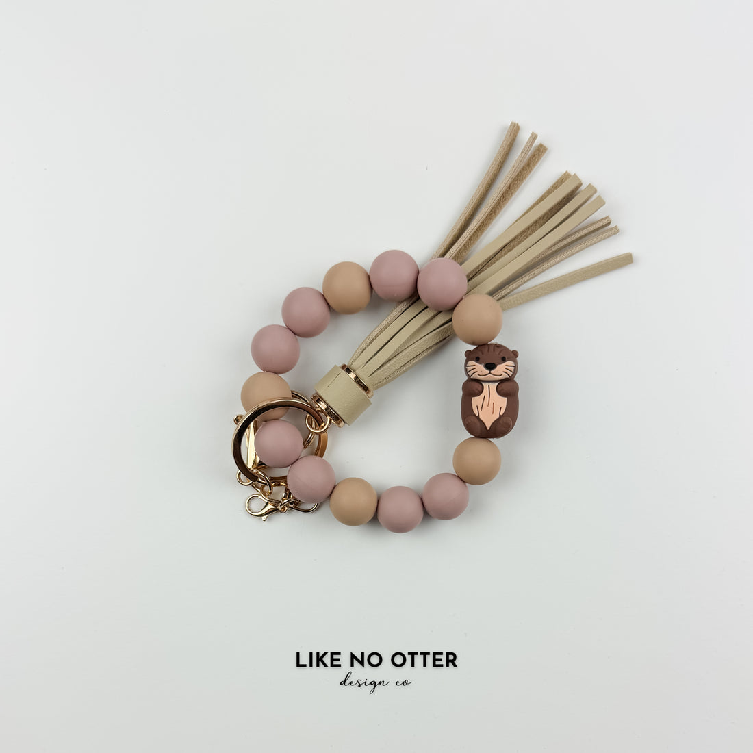 Mauve & Tan Otter Silicone Wristlet