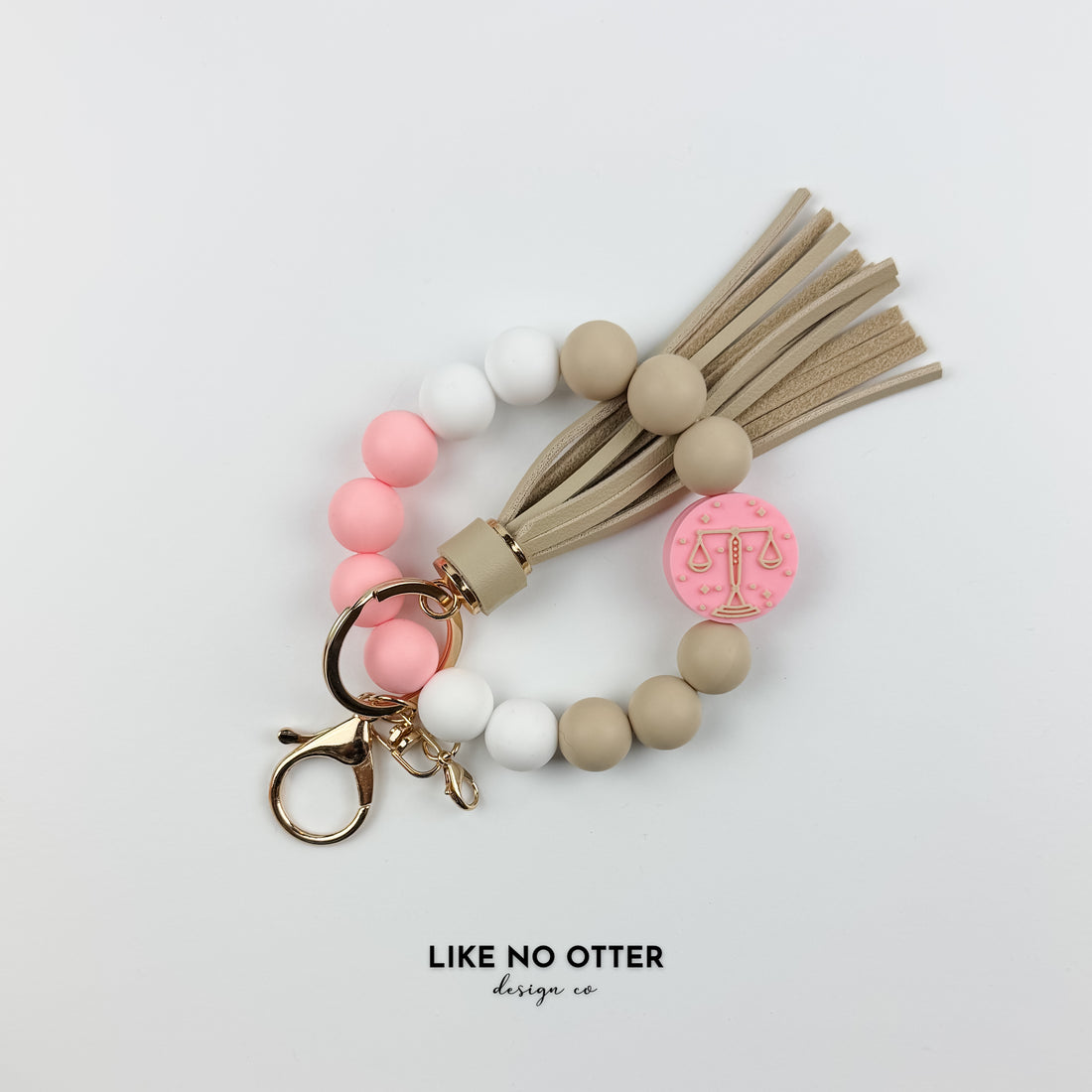Pink & Tan Libra Zodiac Sign Silicone Wristlet