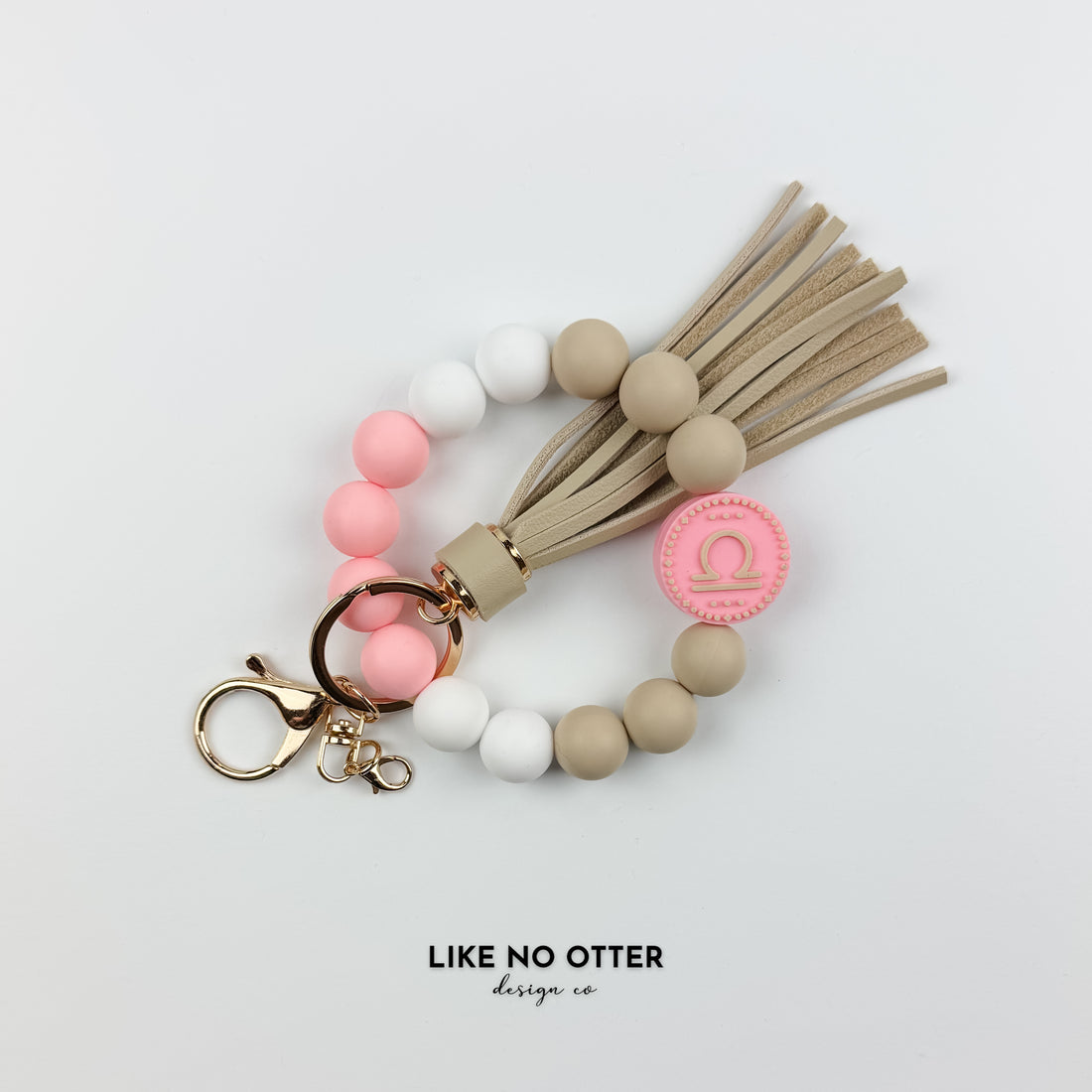 Pink & Tan Libra Zodiac Sign Silicone Wristlet