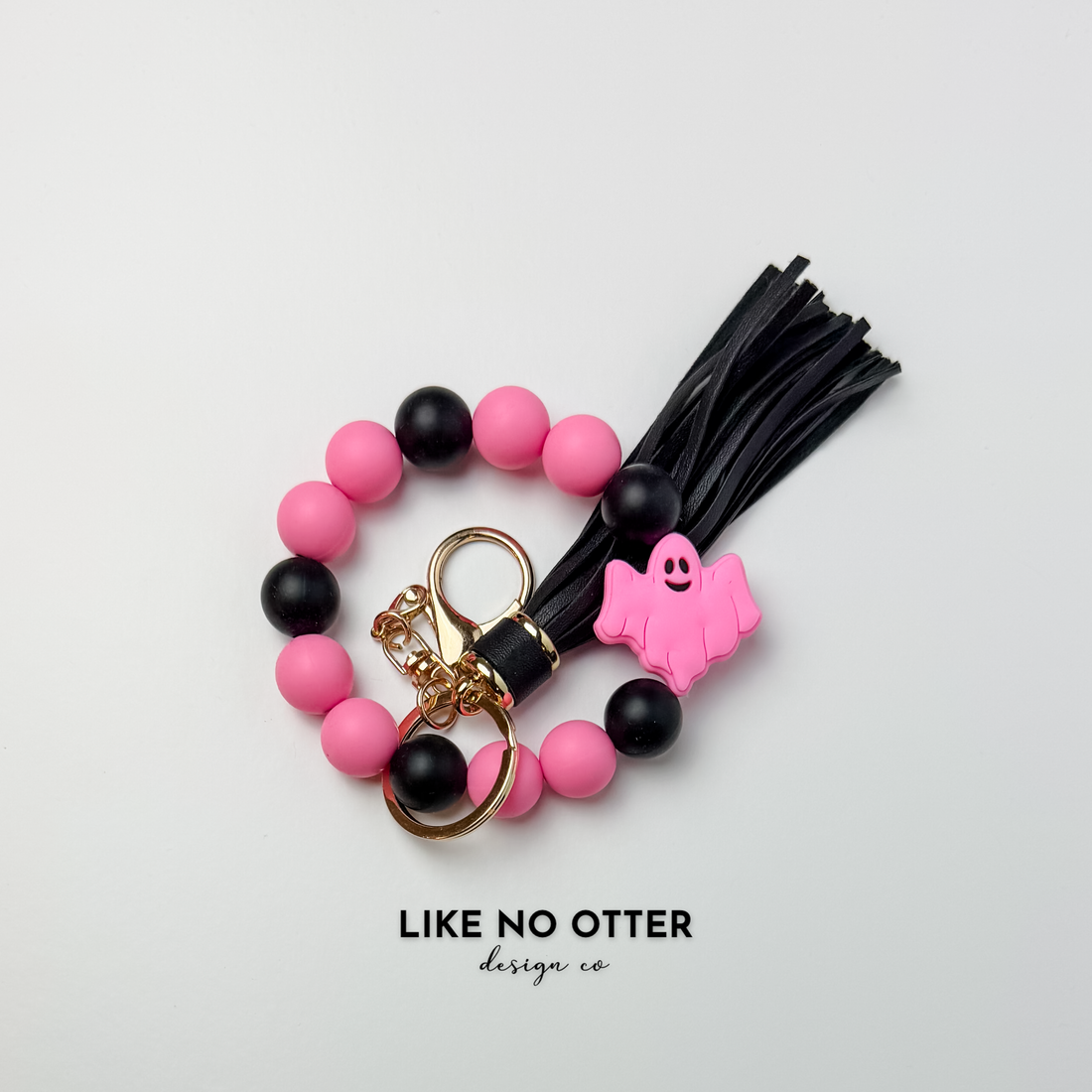 Pink, Black, Ghost Silicone Wristlet