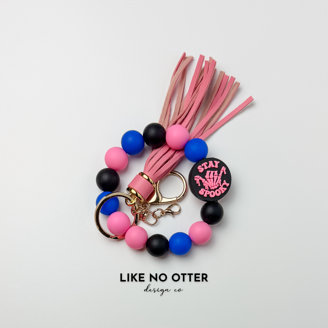 Pink, Black, Blue, Stay Spooky Silicone Wristlet
