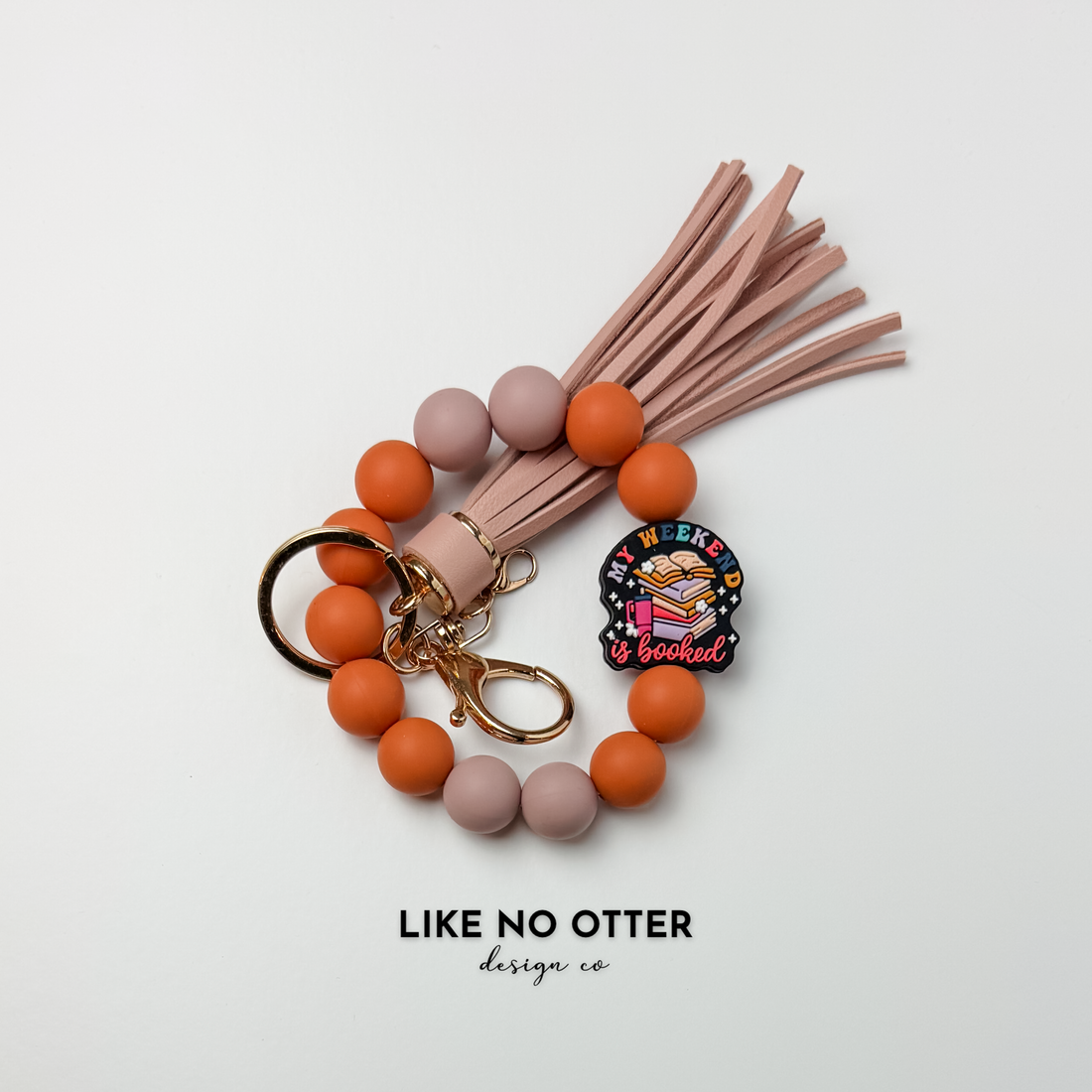 Orange, Mauve, My weekend is booked Silicone Wristlet