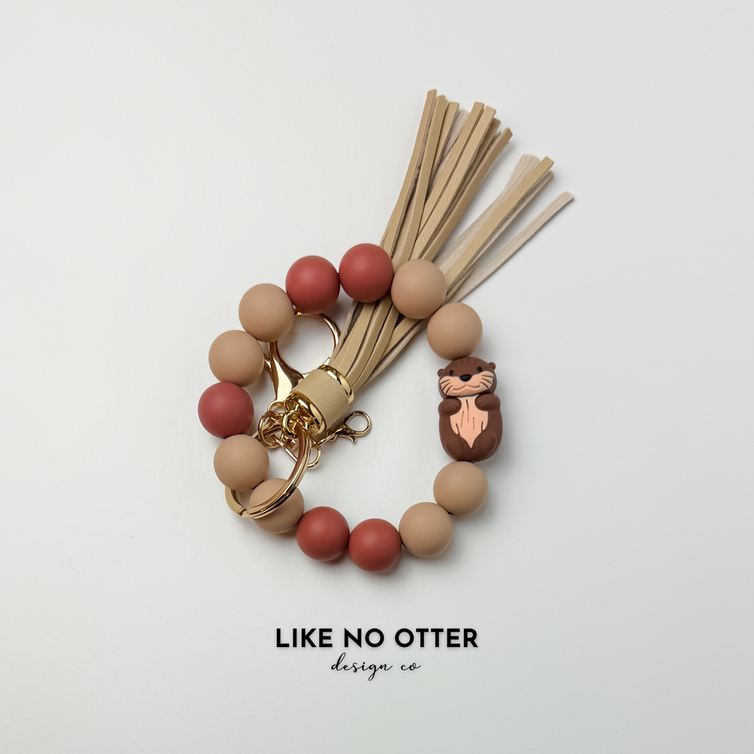 Tan, Brown, Mauve, Otter Silicone Wristlet
