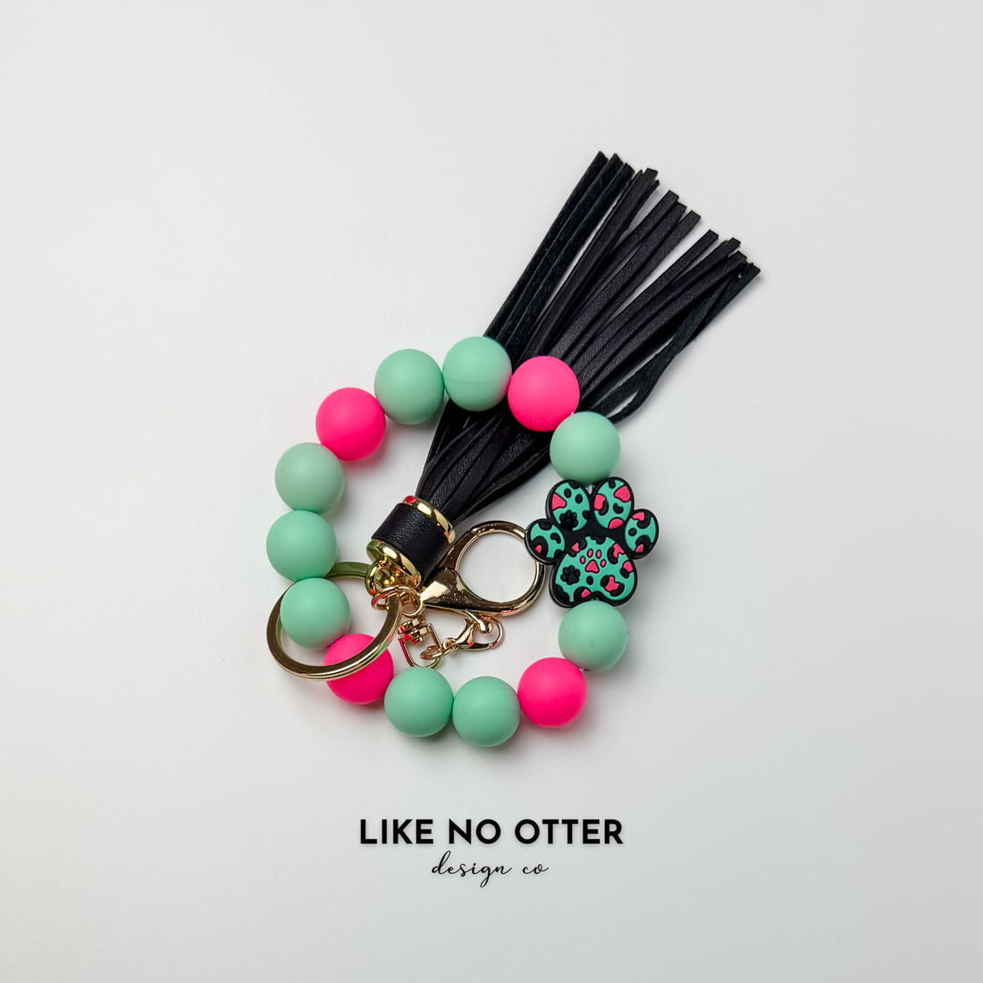 Cheetah Print, Teal, Pink, Black, Paw Print Silicone Wristlet