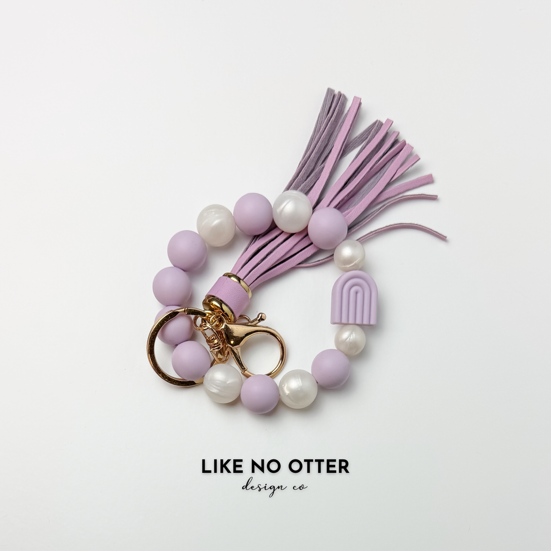 Lavender, Pearl, Rainbow Silicone Wristlet