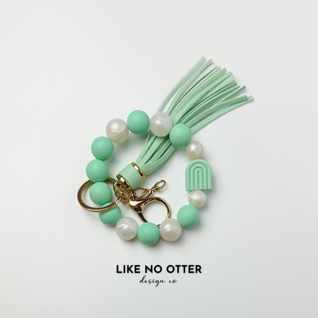 Mint, Pearl, Rainbow Silicone Wristlet