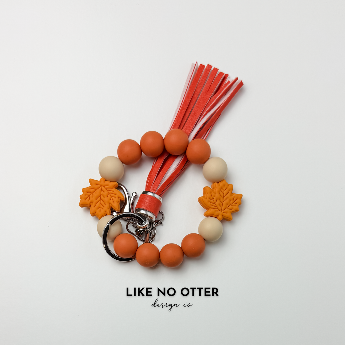 Orange, Cream, Leaves Silicone Wristlet