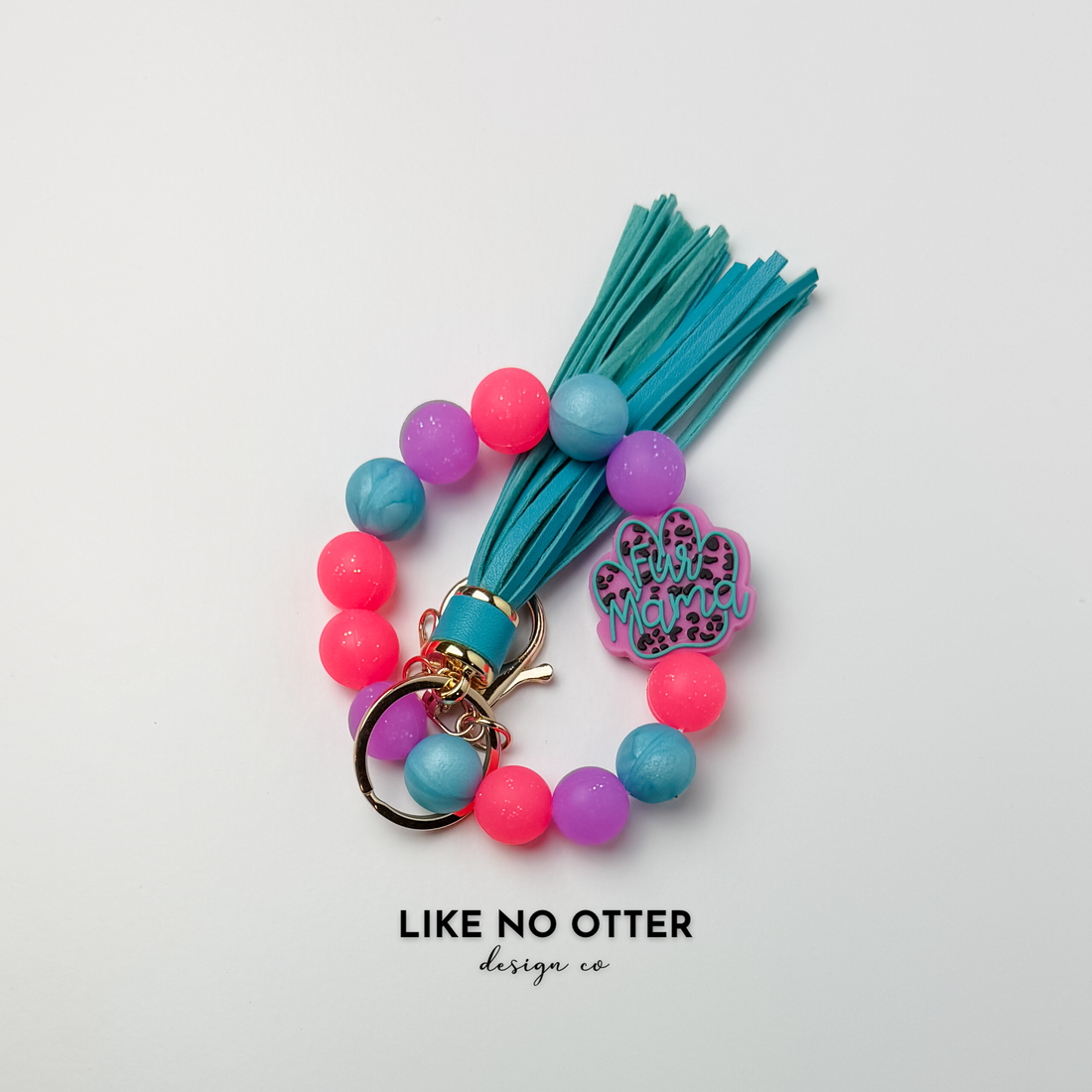 Pink, Teal, Purple, Fur Mom Silicone Wristlet
