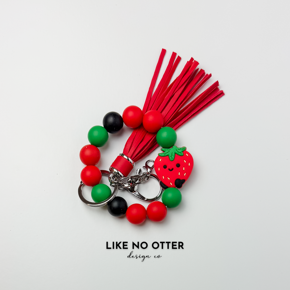Red, Green, Black, Strawberry Silicone Wristlet