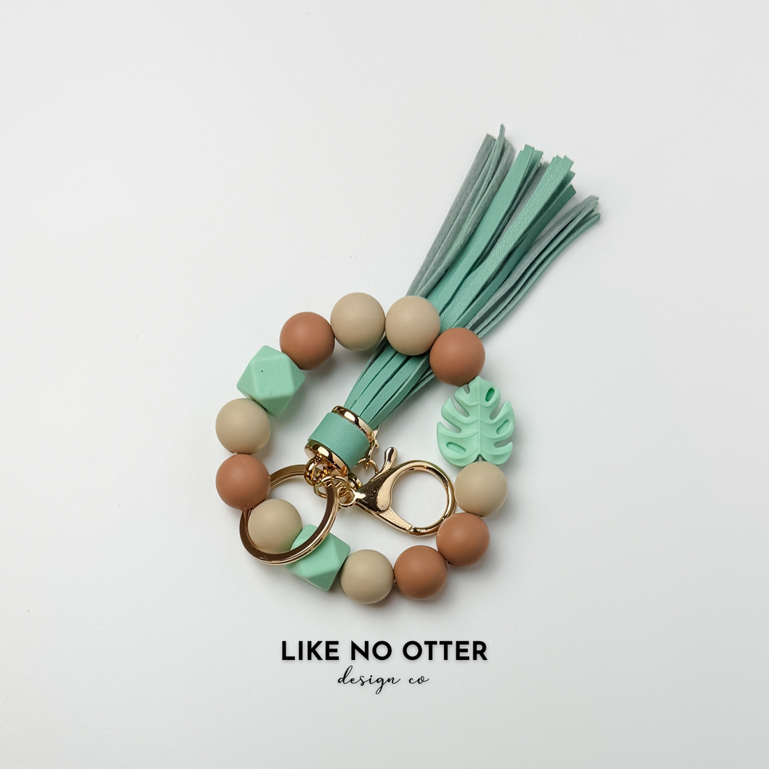 Mint, Brown, Tan, Monstera Leaf Silicone Wristlet